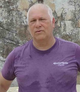 Charles at a beach on a British Virgin Island tour with his wife Susan on September 16th 2018. Photo by Susan Oropallo.